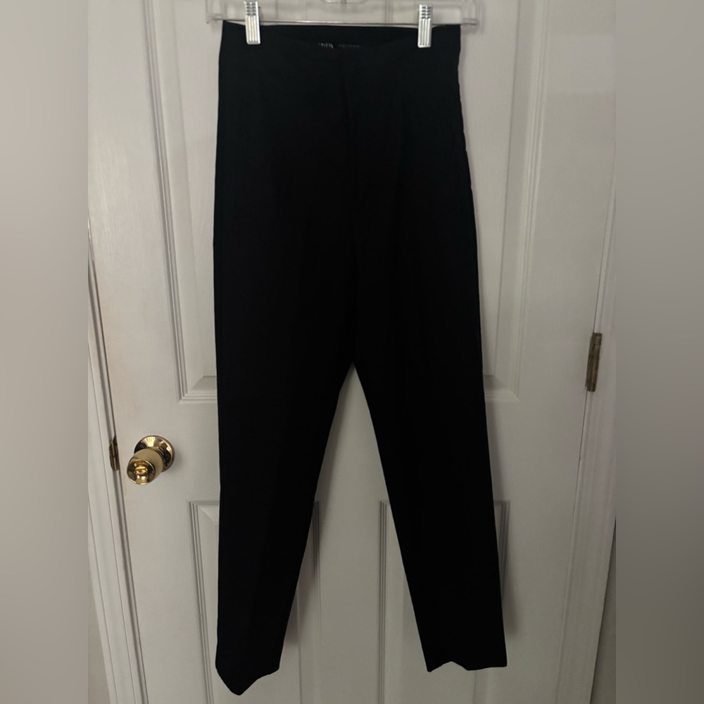 Ladies Black straight leg pants. 27” inseam